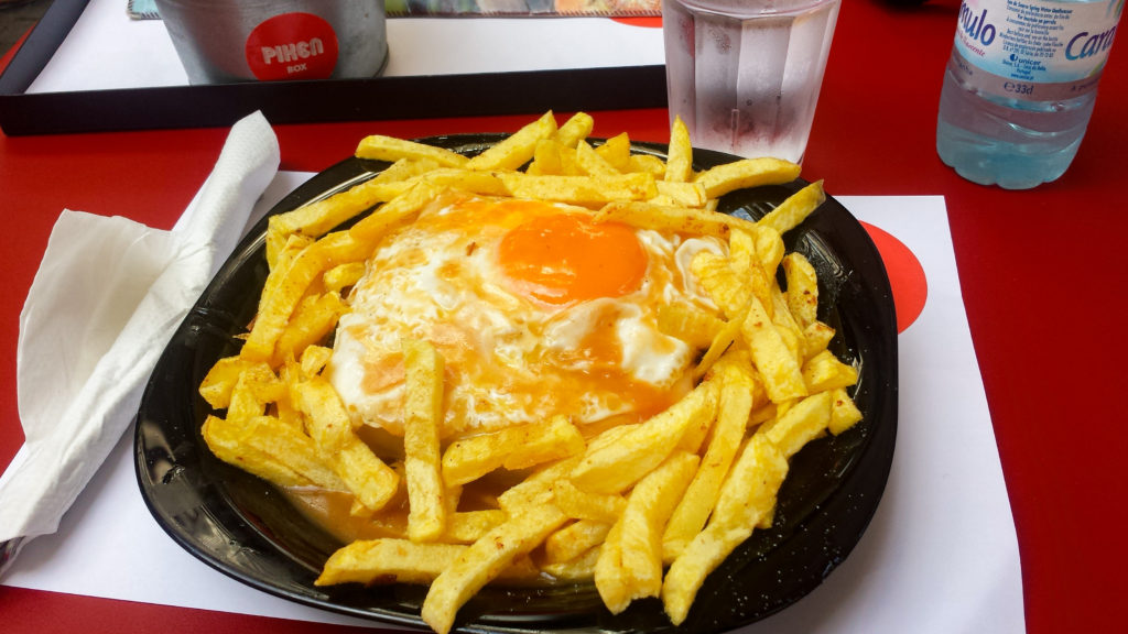 Francesinha with fries, Porto traditional food